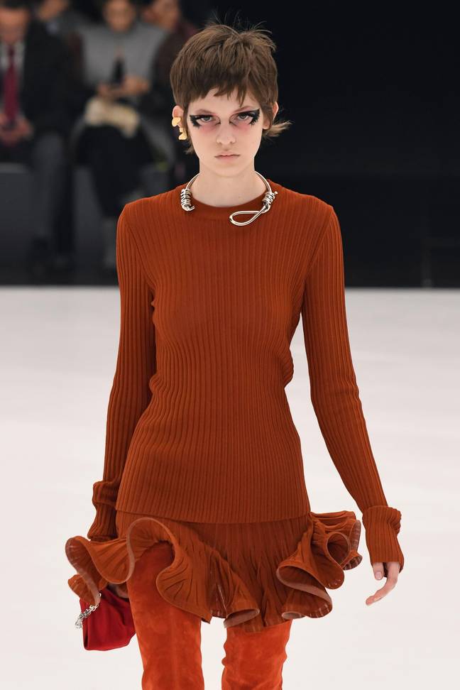 A model wearing the controversial necklace at the Givenchy womenswear spring/summer 2022 show. Credit: dpa picture alliance / Alamy Stock Photo