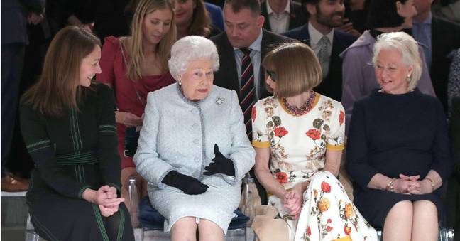 The Queen and Angela Kelly sitting on either side of Anna Wintour.  Credit: PA Images/Alamy Stock Photo
