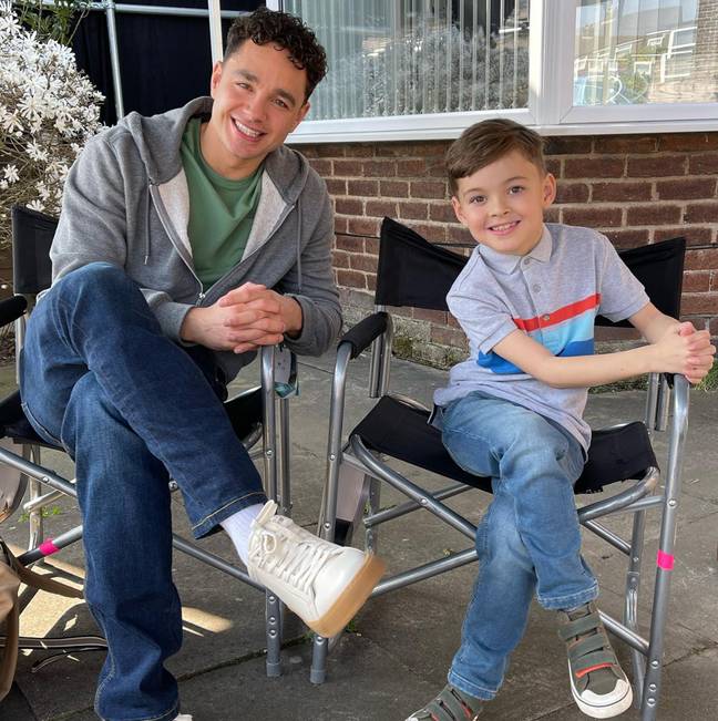 Adam Thomas with son Teddy on the set of Waterloo Road. Credit: Instagram/@adamthomas21