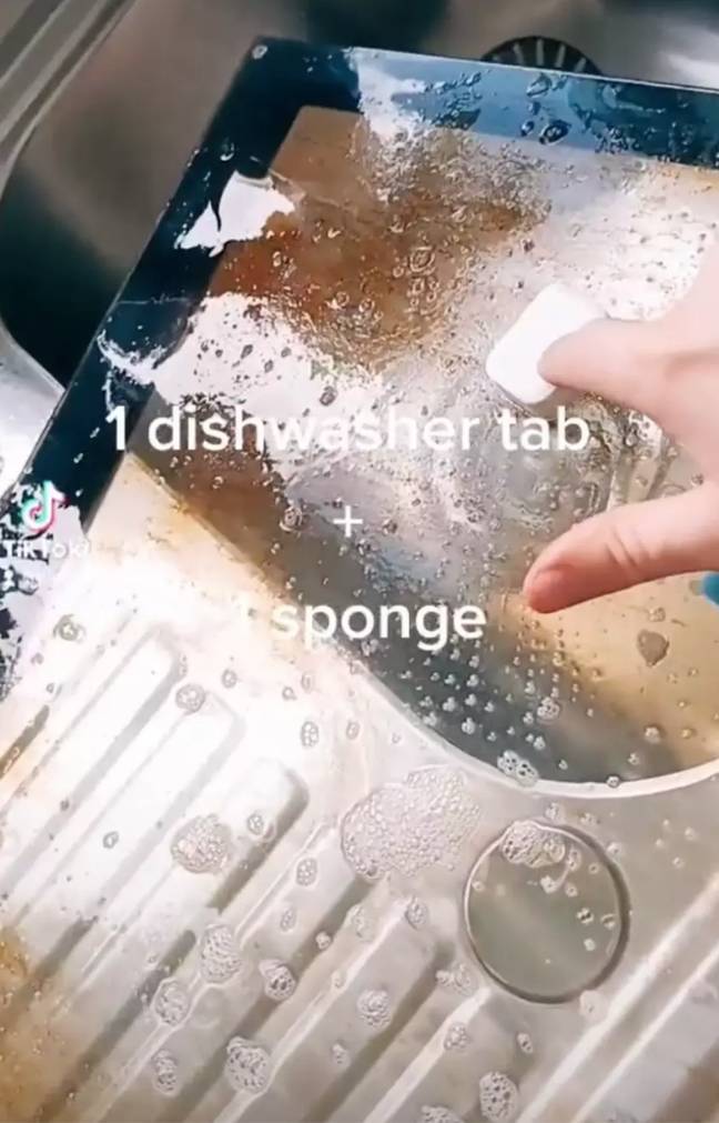 You just need a dishwasher tablet and sponge. Credit: TikTok/@nicolepaigelilly