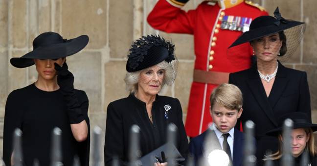 The Duchess of Sussex wiped tears away after the Queen's funeral. Credit: Tim Rooke/Shutterstock
