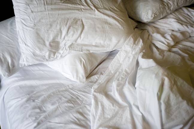 Changing the bed sheets can be a frustrating chore. Credit: Lorie Leigh Lawrence/Alamy Stock Photo
