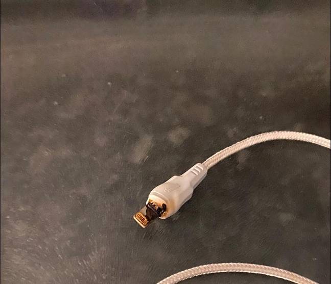 A mum issued a stark warning after her cheap charger started to burn. Credits: Facebook/Nikki McCartney
