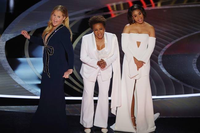 Amy Schumer onstage with co-hosts Regina Hall and Wanda Sykes (Credit: Alamy)