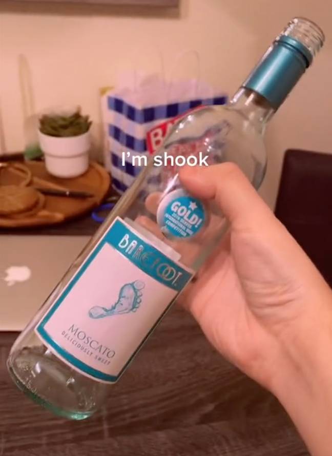 The glass managed to hold the entire bottle of wine (Credit: @gregoreo2/TikTok)