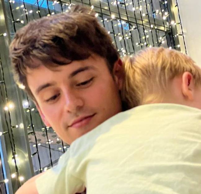 Daley and Black's first child, Robert Ray, is now an older brother. Credit: Instagram/@tomdaley