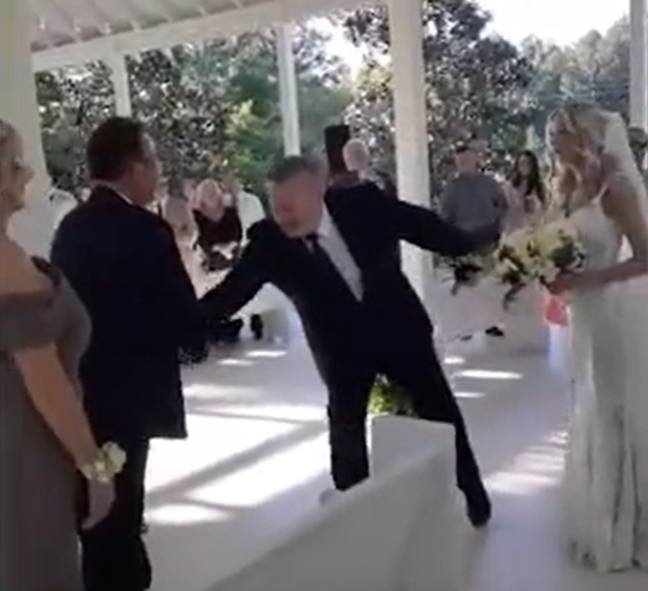 The father of the bride brought her stepfather over to help walk his daughter down the aisle. Credit: TikTok/@_kelseygriffith_