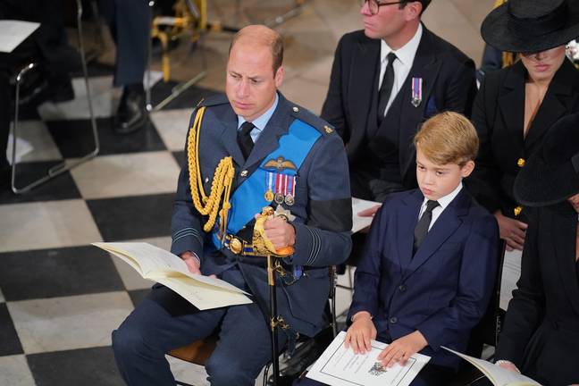 Prince George and his dad Prince William. Credit: PA/Dominic Lipinski.