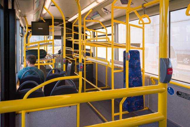 A woman was grabbed and kicked out of her seat on an otherwise empty bus. Credit: Kay Roxby / Alamy Stock Photo