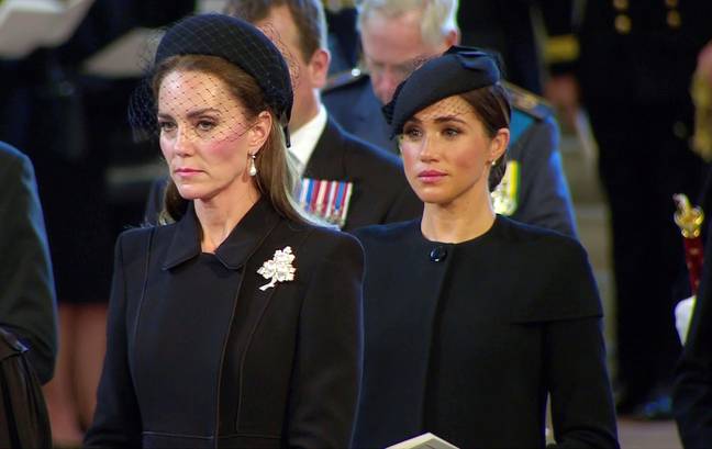 Meghan Markle and Kate Middleton were seen getting emotional at the Queen's coffin procession last week.  Credit: Gavin Rodgers / Alamy Stock Photo