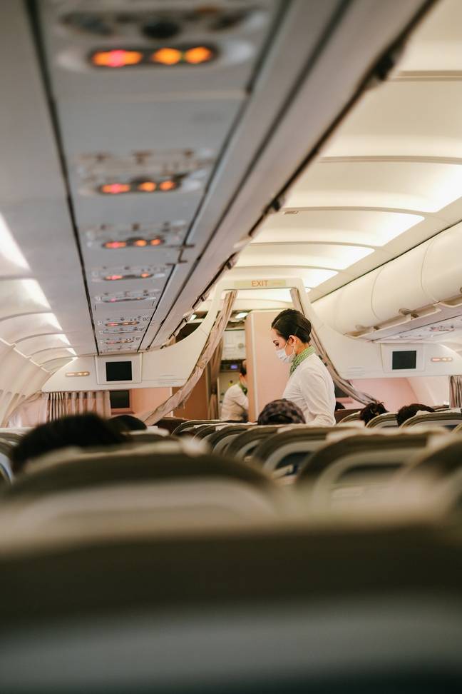 A Virgin Australia flight attendant has revealed why she always books seats in the fifth row when she's not working. Credit: Pexels