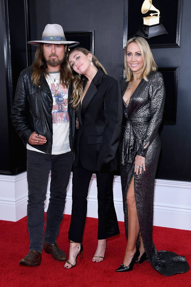 Miley Cyrus with her now-divorced parents Billy Ray and Tish Cyrus. Credit: Amy Sussman/FilmMagic