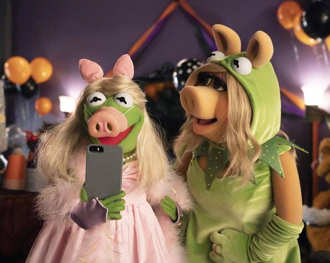 Kermit and Miss Piggy dress as each other for Halloween (Credit: Disney+)