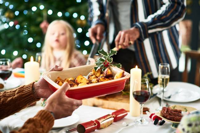 Is it smart or stingy to charge your loved ones for Christmas dinner? Credit: Getty/10'000 Hours