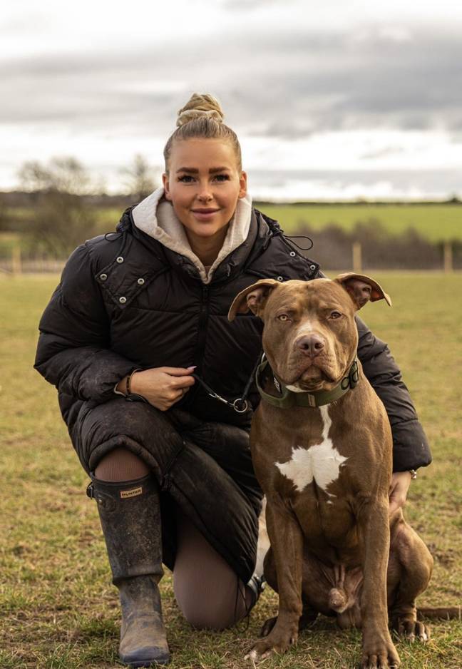 Dog owner Ellee Keegan and her XL bully, Costa. Credits: Kennedy News and Media