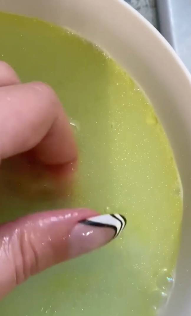 The TikToker soaks her nails in some soap, hot water and oil. Credit: TikTok/@emiliabarlowe