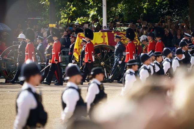 The Queen's coffin being transported from Buckingham Palace to Westminster Hall. Credit: Alamy / David Levenson