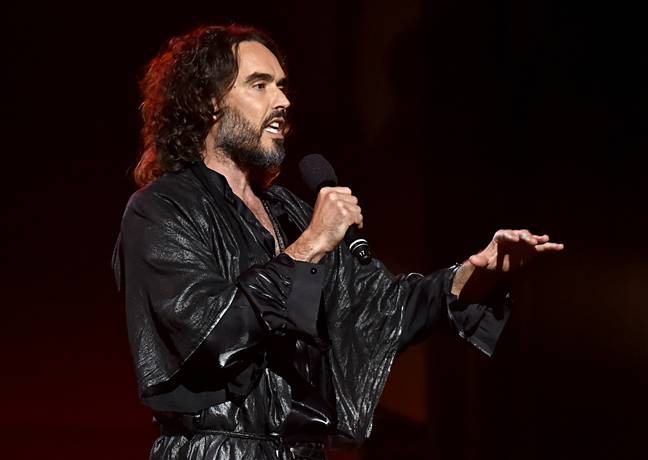 Russell Brand began his career as a comedian. Credit: Getty Images/ Lester Cohen/ The Recording Academy