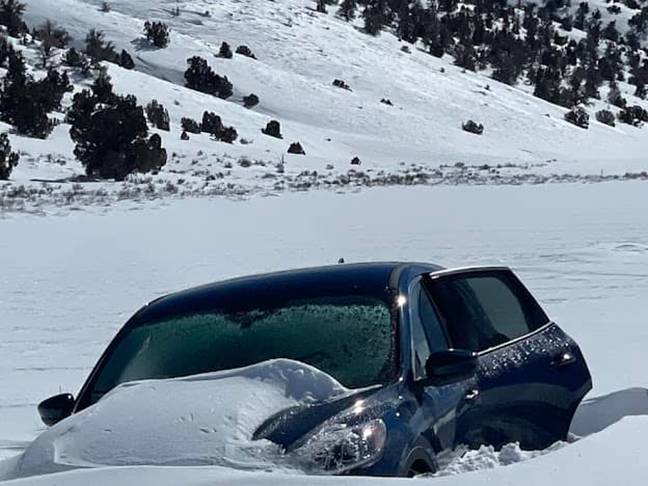The car was submerged by snow with the man inside. Credit: Inyo County Sheriff's Office/ Facebook