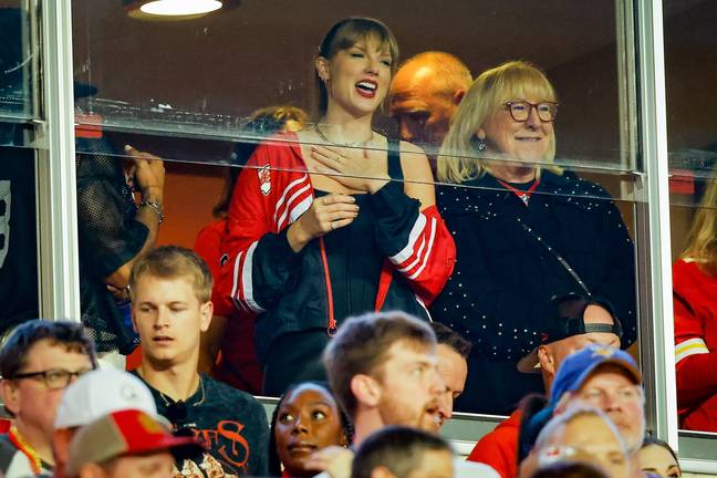 Swift seen with Travis' mom Donna. Credit: David Eulitt/Getty Images