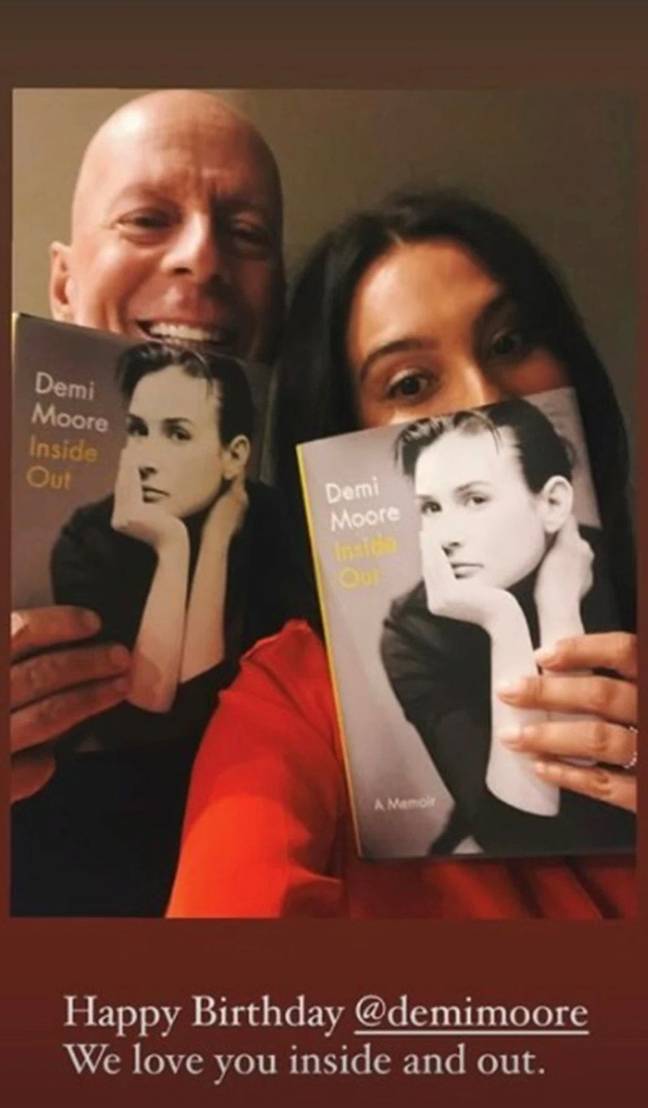Bruce and Emma posed with Demi's memoir to wish her happy birthday. Credit: emmahemingwillis/ Instagram 