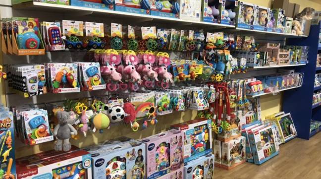 Stranger pays off 8 300 in checks for customers at toy shop