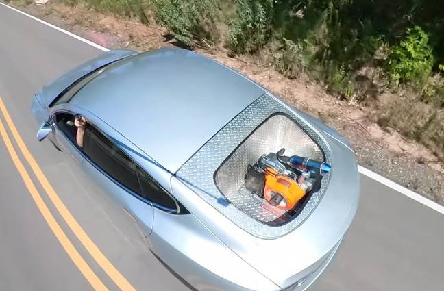 YouTuber Matt Mikka added a gas generator to his Tesla to see if he could take it on a road trip. Credit: YouTube/Warped Perception