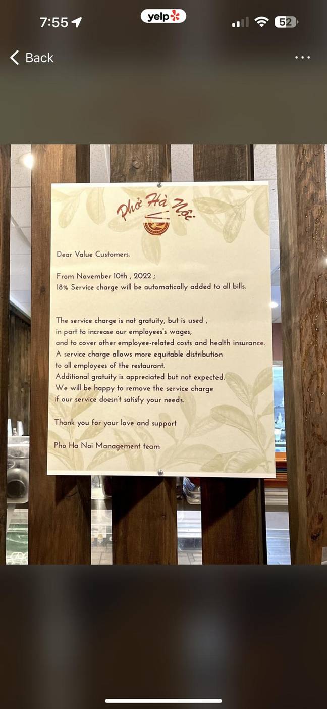 The restaurant posted a note outside informing people of the charge. Credit: Yelp
