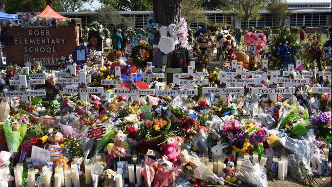 A memorial of flowers at Robb Elementary School in Uvalde. Credit: UPI / Alamy Stock Photo