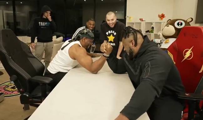 Adin Ross' bodyguard Ant got into an arm wrestling competition live on stream. Credit: Twitch/Adin Ross