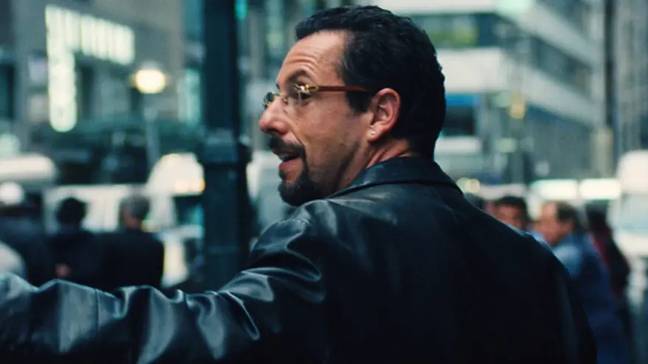 Sandler received heaps of praise for his portrayal of a charismatic New York City jeweller Howard Ratner. Credit: A24/Netflix