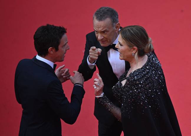 Tom Hanks and Rita Wilson were seen looking 'furious' on the red carpet at Cannes. Credit: NTONIN THUILLIER/AFP