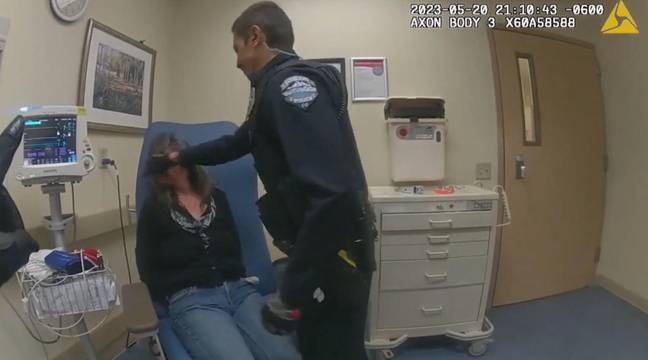 The officer was filmed striking the woman in the face. Credit: City of Loveland