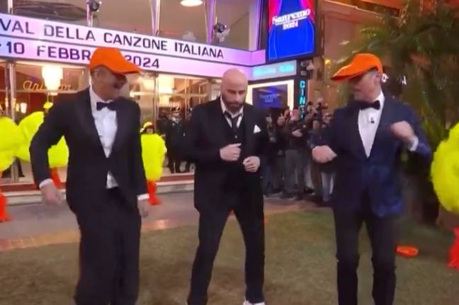 John Travolta non sembrava molto entusiasta di ballare. Credito: Ray