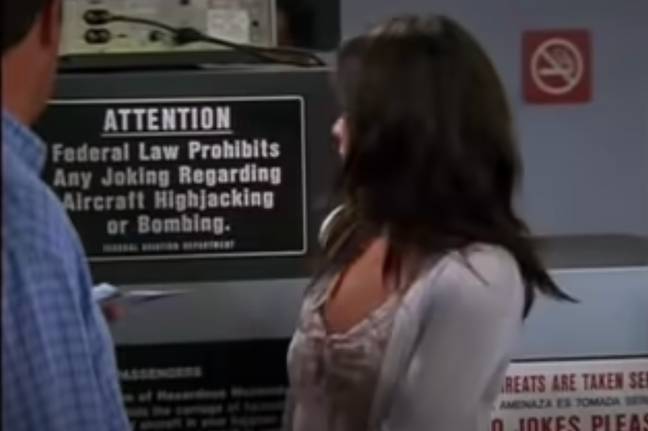 Chandler made a joke about bombs after reading the airport sign. Credit: NBC/ Warner Bros. Television