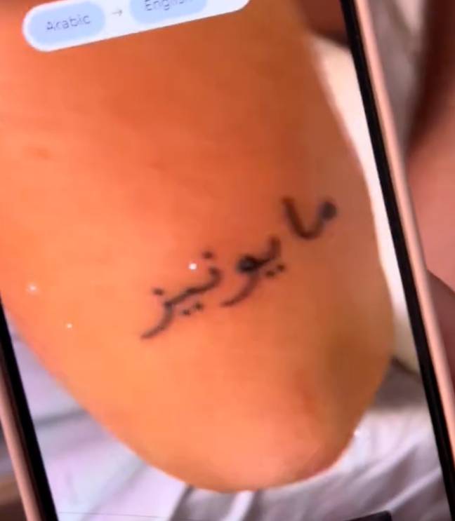 A tourist who went to Morrocco, decided to say screw sensibility and now has a tattoo which has seen her mocked. Credit: TikTok/caitdelphine