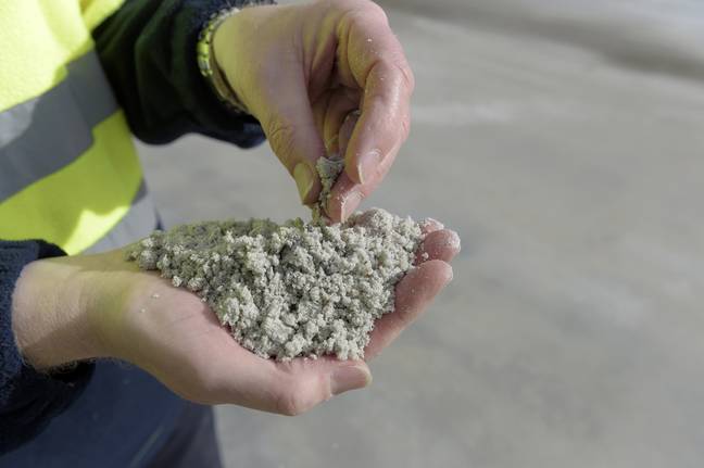 Lithium gets the name 'white gold' from its white, sand-like appearance. Credits:  Carla Gottgens/Bloomberg