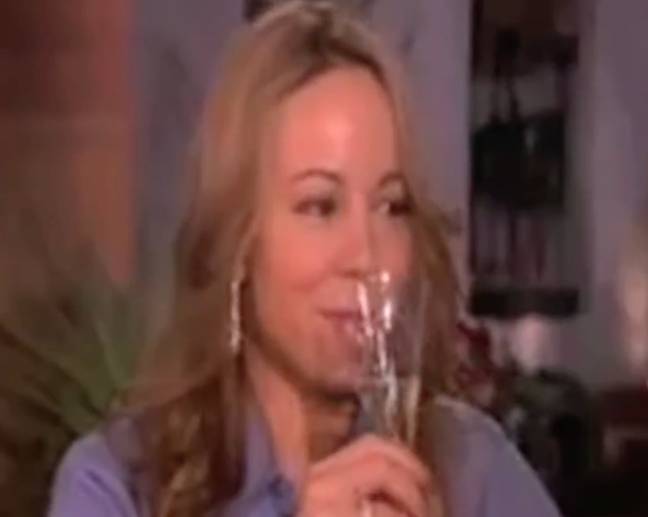 Mariah Carey ended up reluctantly drinking the champagne. Credit: The Ellen DeGeneres Show