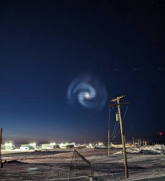 A mysterious giant spiral has left people in search of catching a glimpse at the famed northern lights utterly baffled. Credit: Facebook/Elizabeth Withnall
