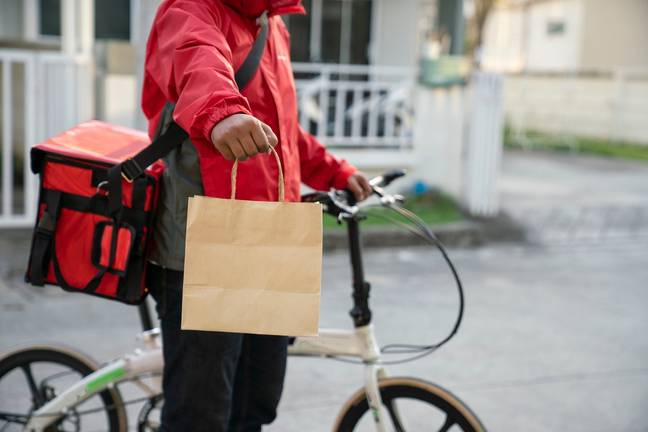 Working as a delivery driver at Christmas is hard work. Credit: Getty Stock Photo