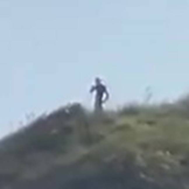 One of the figures on top of the hill. Credit: Jam Press