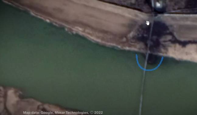 The black splotch Bogle reckons may be nuclear waste being dumped in a river. Credit: Vice/Google Maps/Maxar