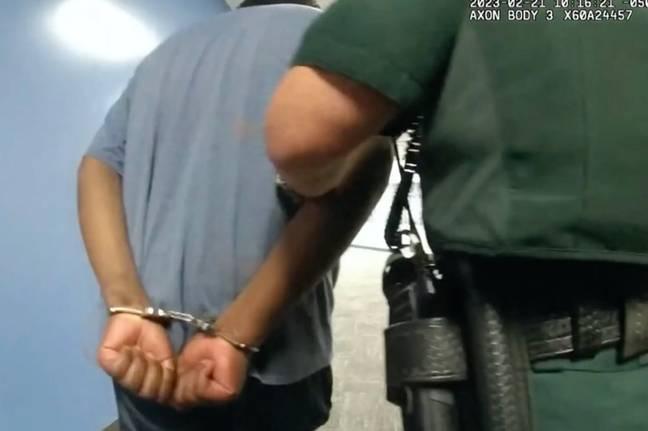 Depa, handcuffed here, after the incident. Credit: Flagler County Sherriff's Office