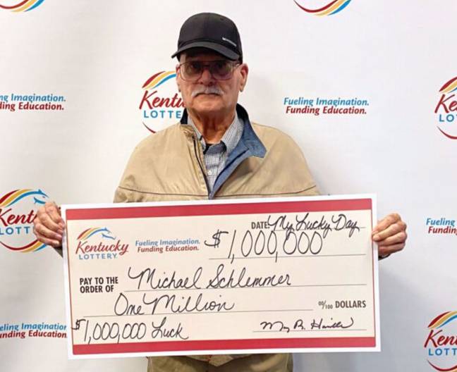 Michael Schlemmer with his $1 million check. Credit: Kentucky Lottery