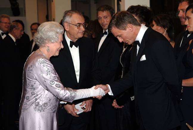 Daniel Craig with the Queen. (Alamy) 