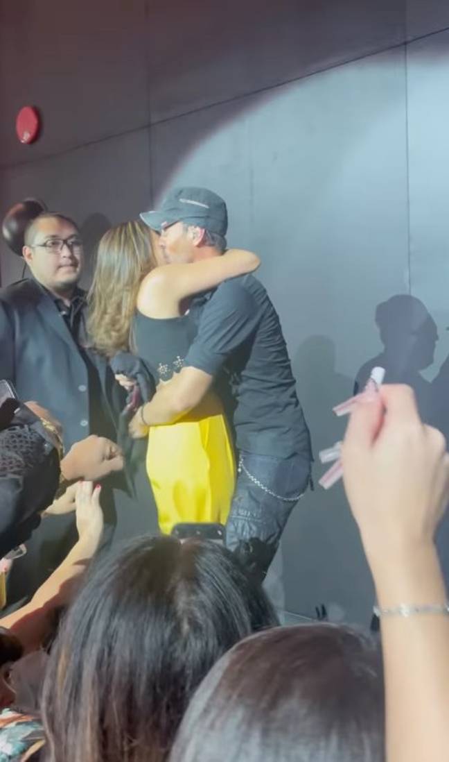 Enrique seemed taken aback when the fan lunged in for a kiss. Credit: Instagram/@enriqueiglesias