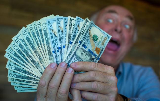 Stock picture of lottery winner. Credit: Suzanne Plunkett / Alamy 