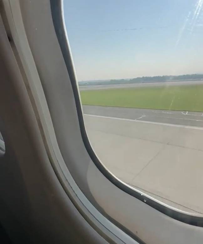 A passenger on board the Delta flight that came down safely with no front landing gear filmed the experience as they touched down on tarmac. Credit: Edward Cates/LOCAL NEWS X /TMX
