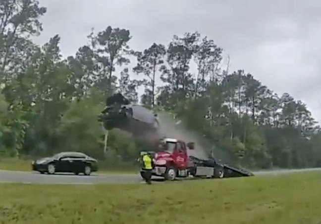 The woman’s car flew 120ft after running up the tow truck. Credit: Lowndes County Sheriff's Office 