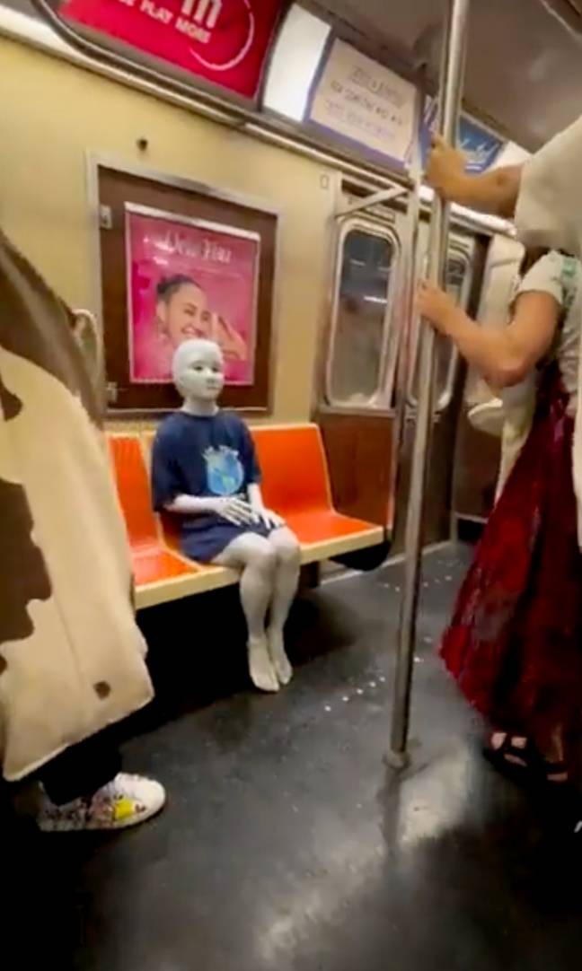 The alien was spotted quietly riding the subway. Credit: Twitter/@antony67